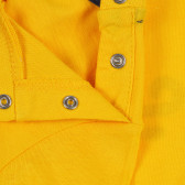 Βαμβακερό μπλουζάκι με τη λεζάντα Smile για ένα μωρό, κίτρινο Idexe 239339 3
