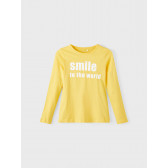 Κίτρινη βαμβακερή μακρυμάνικη μπλούζα με την επιγραφή &#39;&#39;Smile to the world&#39;&#39; Name it 336300 