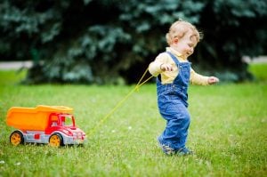 little,boy,playing,toy