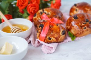 Beautiful,breakfast,,a,date,,buns,with,raisins,,butter,and,honey,