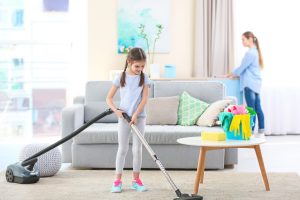 Mother,and,daughter,cleaning,home,together