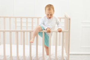 Baby,boy,2,years,old,gets,out,of,the,crib.