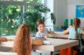 cute,little,pupils,during,lesson,in,classroom