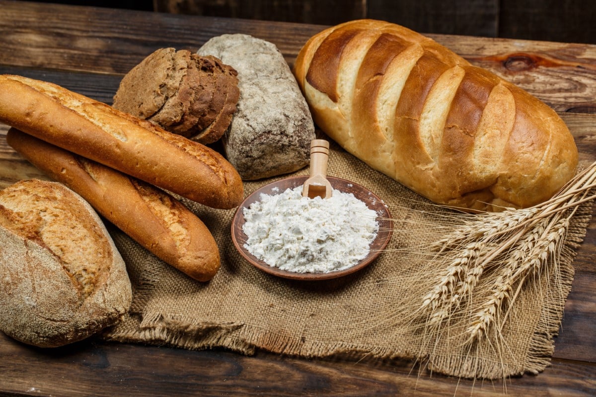 fresh,loaves,of,bread,with,wheat,and,gluten,on,a