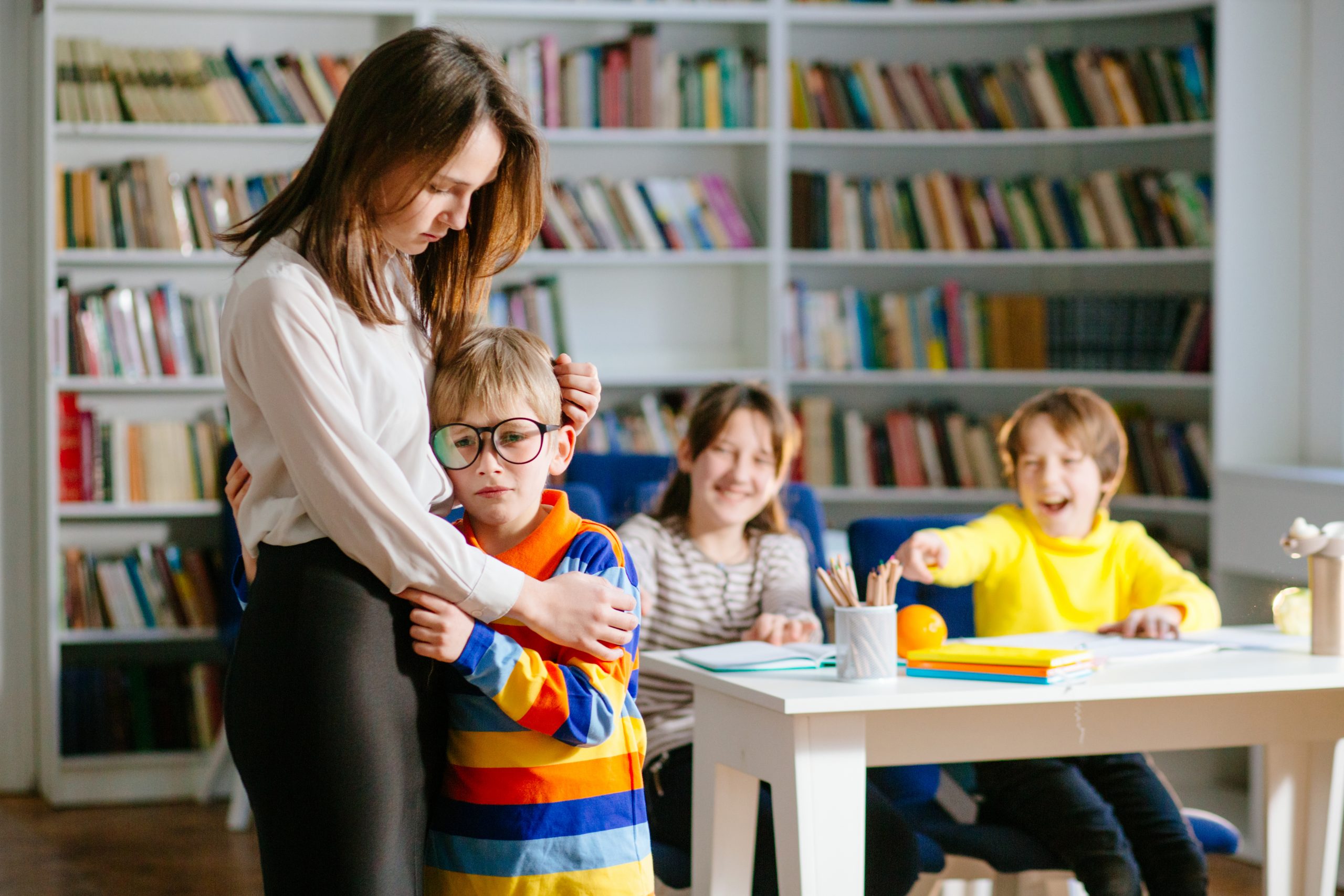 teacher,calms,stressed,school,boy,child,,bullying,victim,being,by