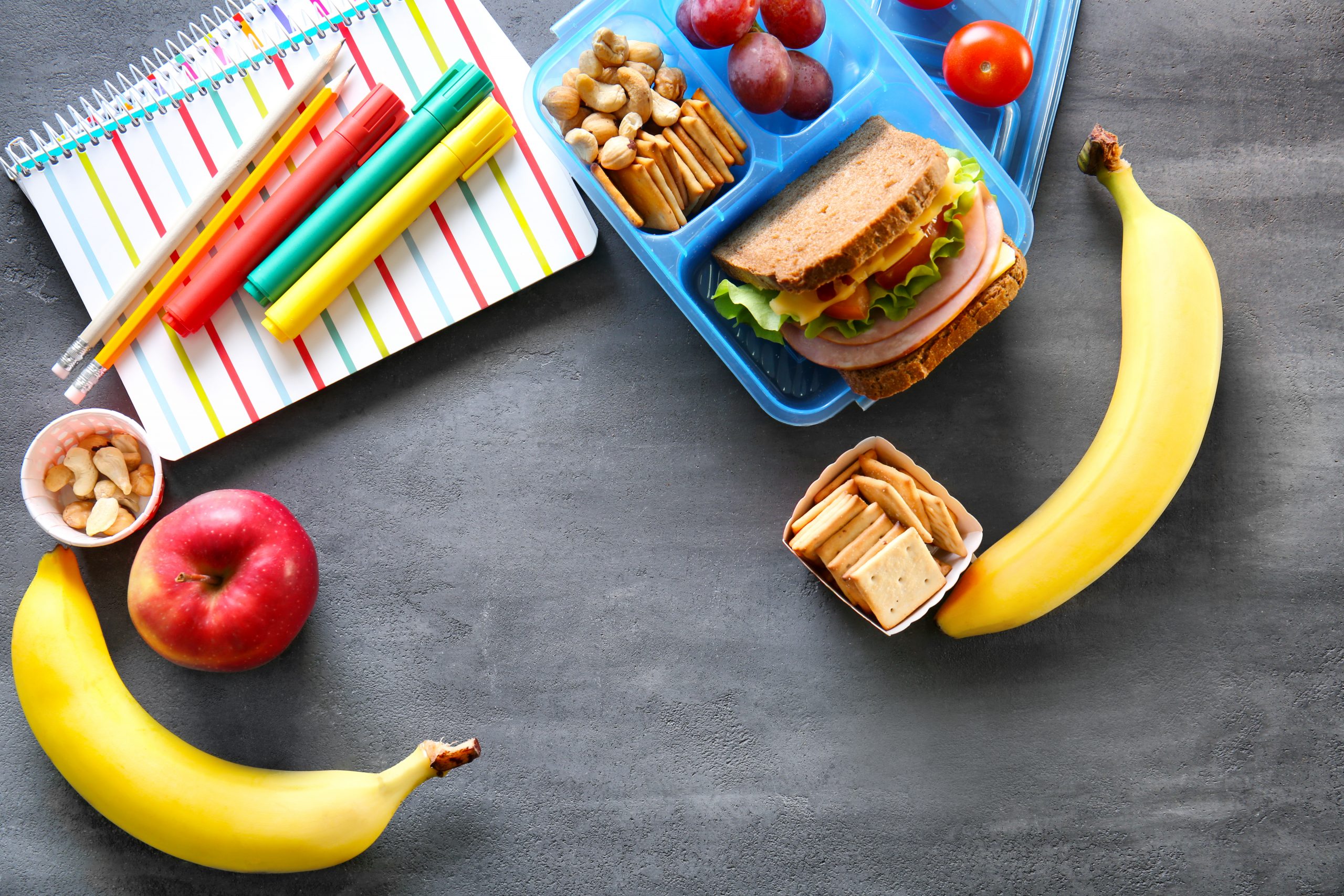 school,lunch,and,stationery,on,table